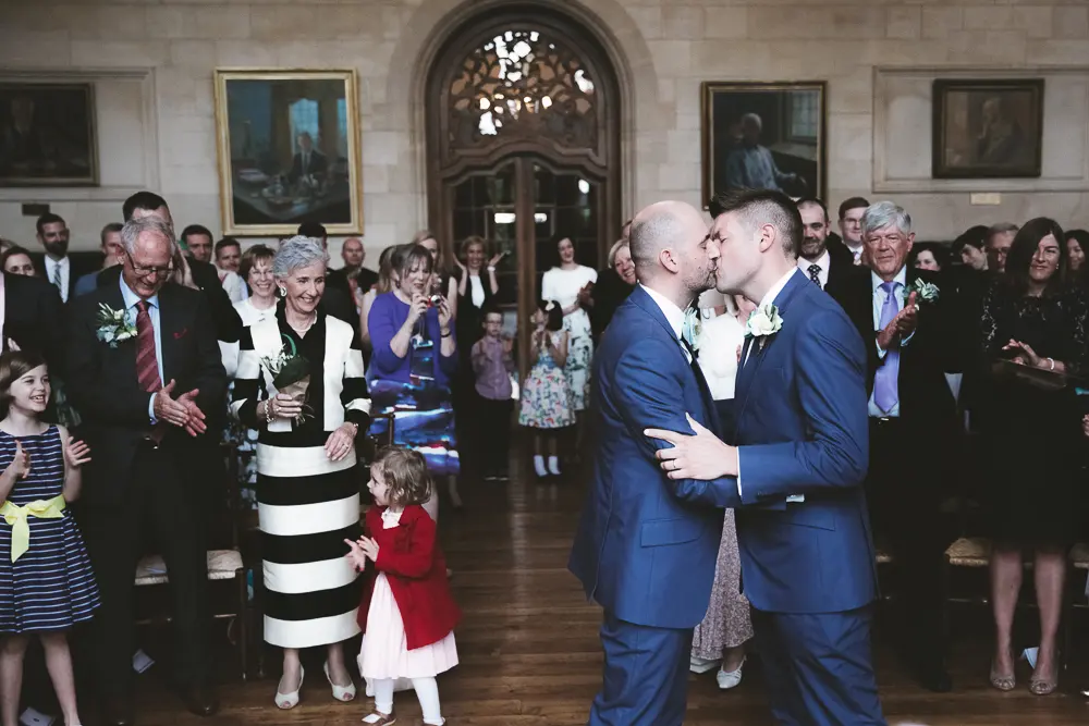Grooms first kiss at Rhodes House Wedding
