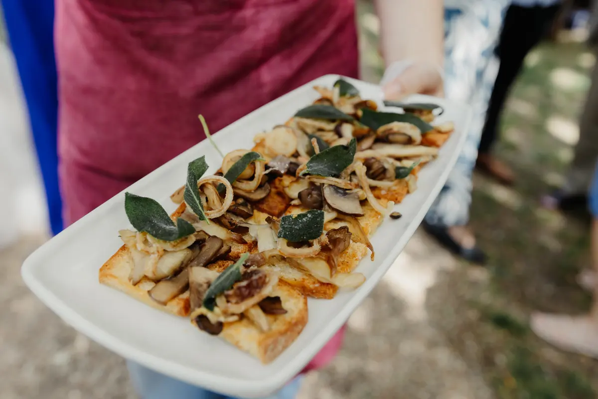 Plate of mushroom and crispy sage toasts carried round as canapés