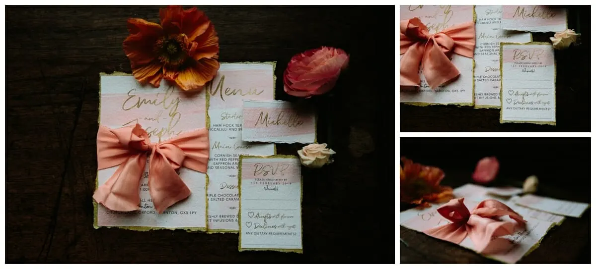 Wedding stationery with peach ribbon, a menu and RSVP cards styled with flowers on dark wood