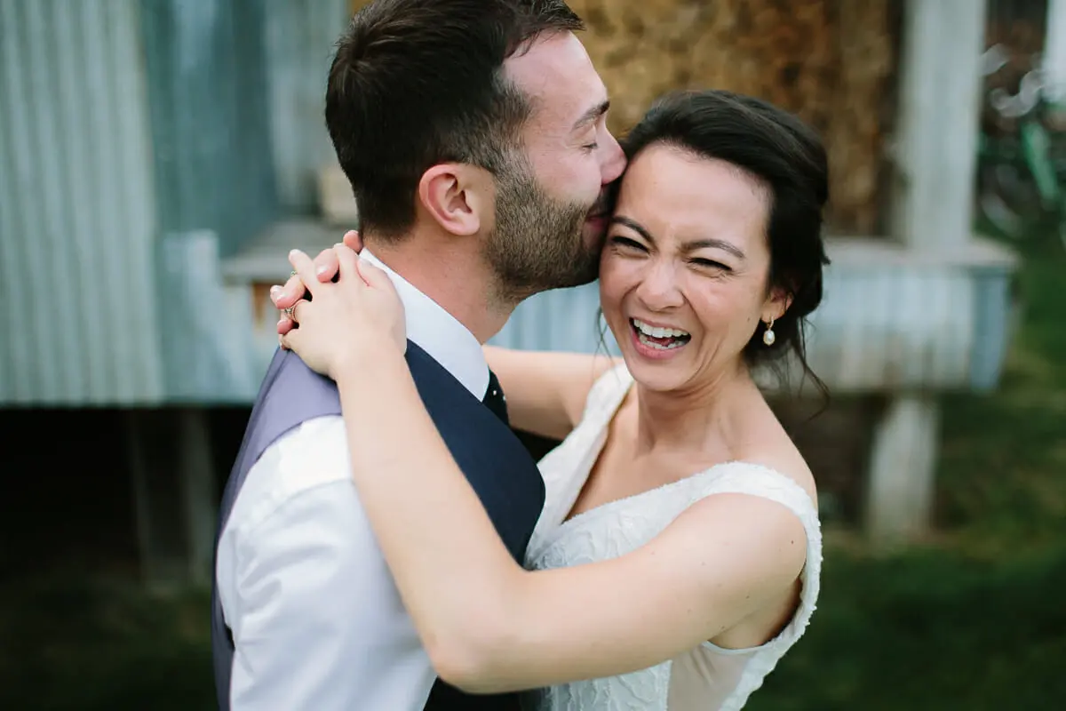 Soho Farmhouse Wedding - Bride + Groom kissing