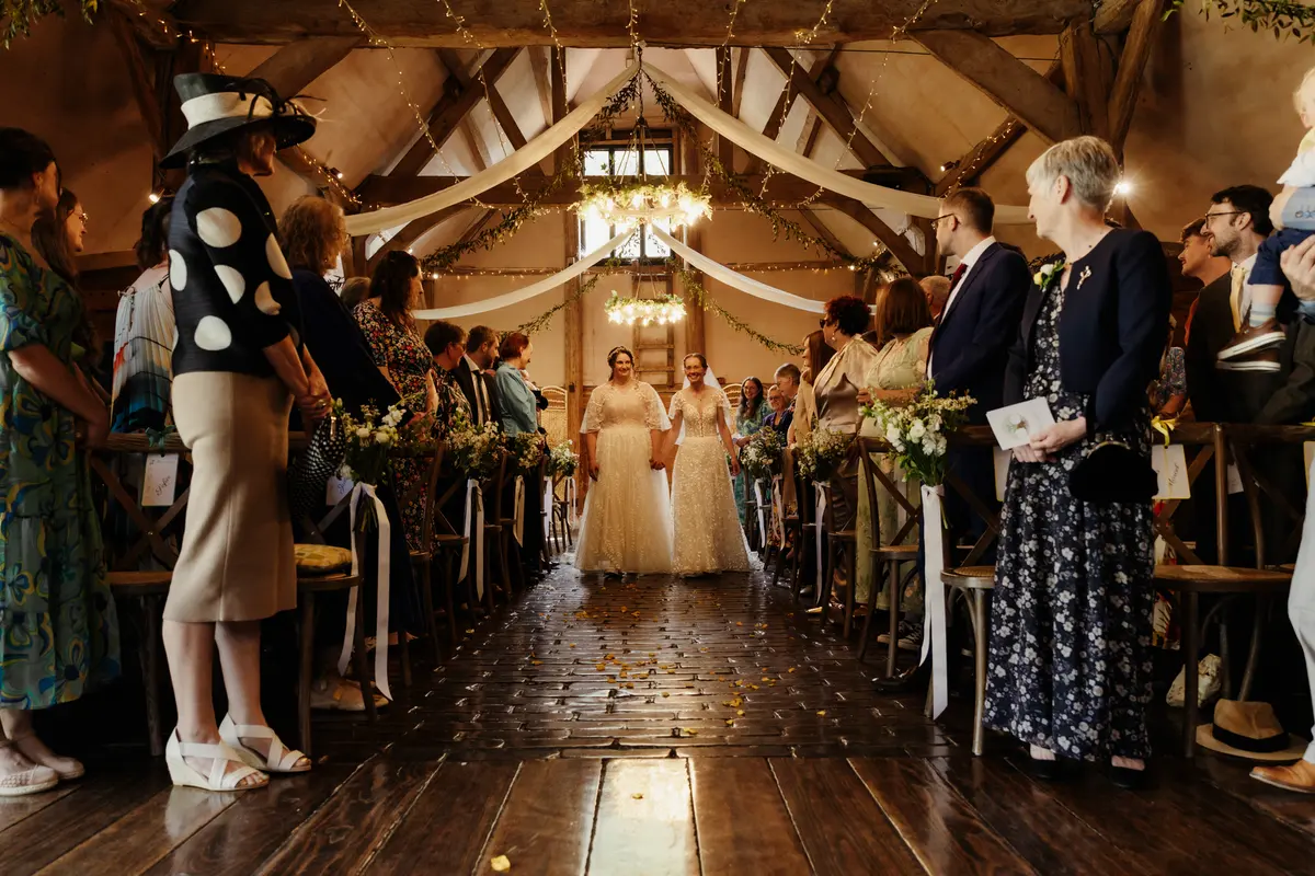 Two brides getting married at Lains Barn Wedding in Oxfordshire
