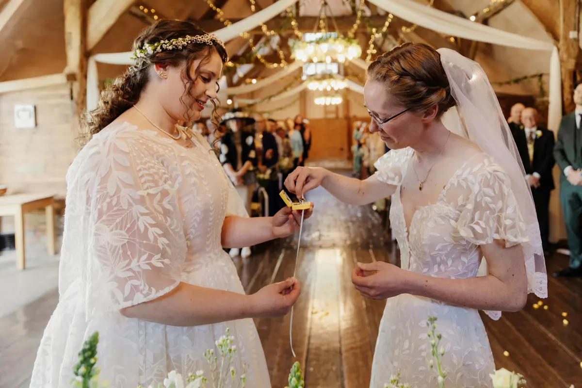 ring exchange at Lains Barn Wedding Venue