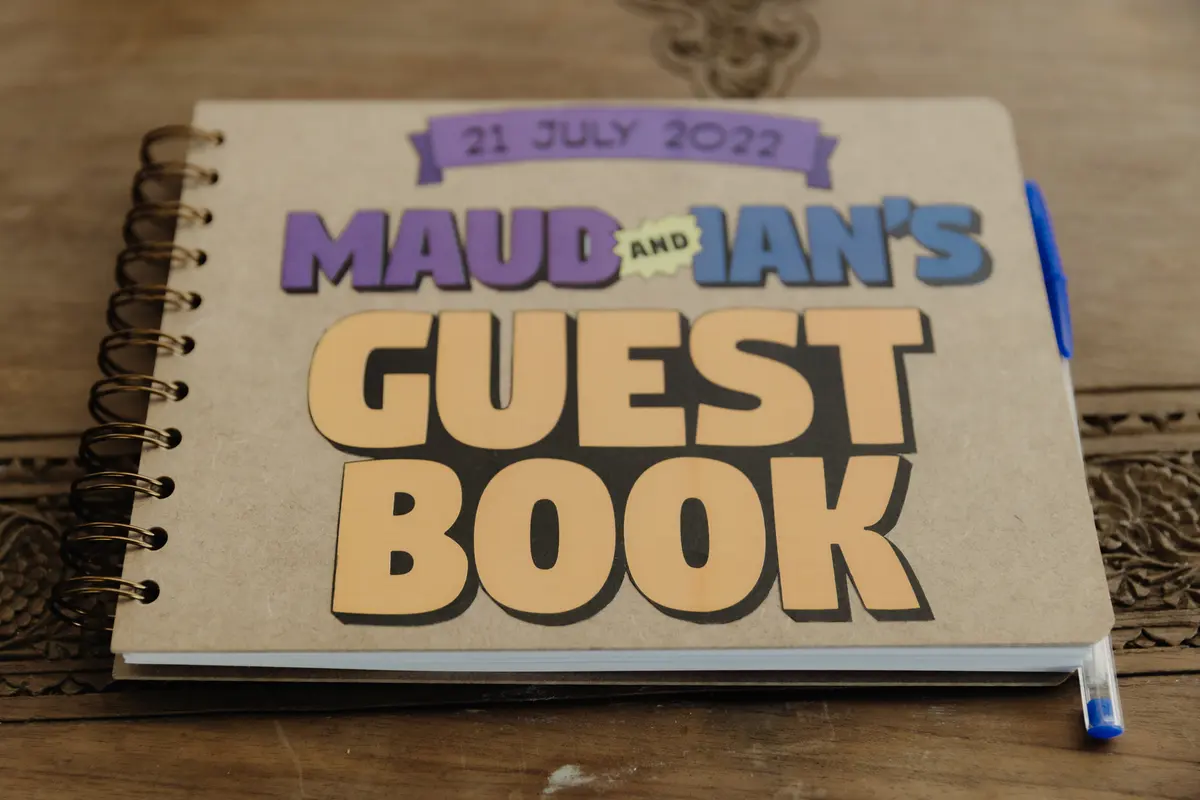 lose-up of guest book, wedding décor